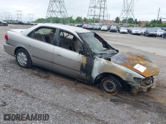 1999 Honda Accord LX with VIN 1HGCG6659XA113823, listed as a IAAI auction lot 42462228 with Not provided miles and . Bid and sale history available at DreamBid. Image 1.