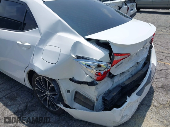 2014 Toyota Corolla L with VIN 5YFBURHE1EP063722, listed as a IAAI auction lot 42161425 with 148,227 mi miles and . Bid and sale history available at DreamBid. Image 6.
