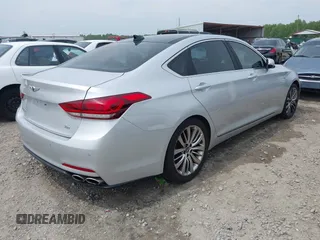 2017 Genesis G80 Ultimate z VIN KMHGN4JF6HU209477, wystawiony jako IAAI lot #42056310 z przebiegiem 134 288 mil mil oraz . Historia ofert i sprzedaży dostępna na DreamBid. Obrazek 4.