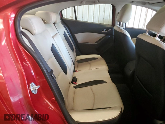 2014 Mazda 3 S Grand Touring z VIN JM1BM1W31E1145909, wystawiony jako Copart lot #53729895 z przebiegiem 125 739 mil mil oraz Szkoda całkowita • Salvage title. Historia ofert i sprzedaży dostępna na DreamBid. Obrazek 10.