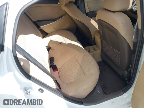 2014 Hyundai Accent GLS with VIN KMHCU4AE8EU608539, listed as a IAAI auction lot 41946784 with 106,709 mi miles and . Bid and sale history available at carsss.com. Image 8.