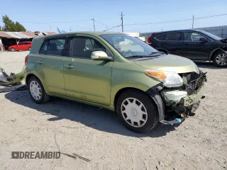 2009 Scion xD with VIN JTKKU10439J048050, listed as a Copart auction lot 57972925 with 104,405 mi miles and Salvage title. Bid and sale history available at DreamBid. Image 4.