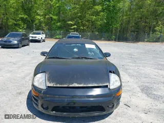 2004 Mitsubishi Eclipse GS with VIN 4A3AE45G74E043050, listed as a IAAI auction lot 39144972 with 190,174 mi miles. Bid and sale history available at carsss.com. Image 6.