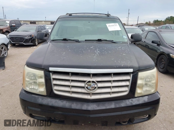 2003 Cadillac Escalade z VIN 1GYEC63T43R206146, wystawiony jako IAAI lot #41335727 z przebiegiem Nie podano mil oraz . Historia ofert i sprzedaży dostępna na DreamBid. Obrazek 6.