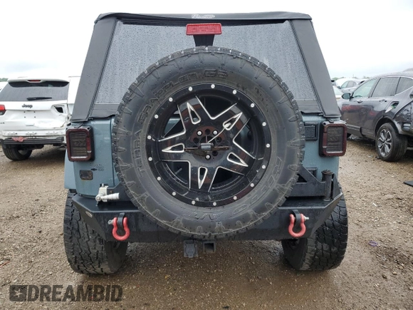 2014 Jeep Wrangler Sport с VIN 1C4AJWAG1EL117219, выставлен на аукционе Copart как лот 59696355 с пробегом 105 865 миль миль и Списание • Salvage title. История ставок и продаж доступна на DreamBid. Изображение 6.