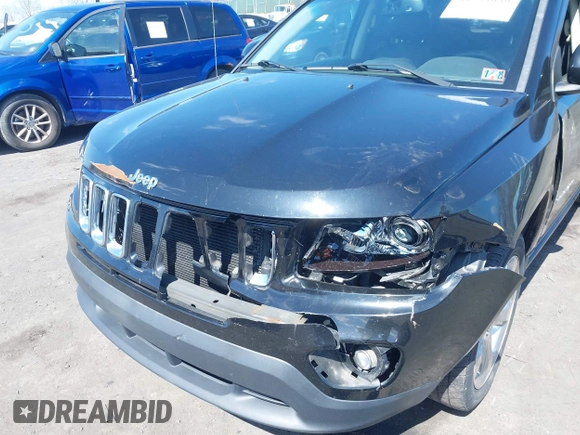 2014 Jeep Compass Limited with VIN 1C4NJDCBXED706173, listed as a IAAI auction lot 41784040 with 144,368 mi miles. Bid and sale history available at carsss.com. Image 6.