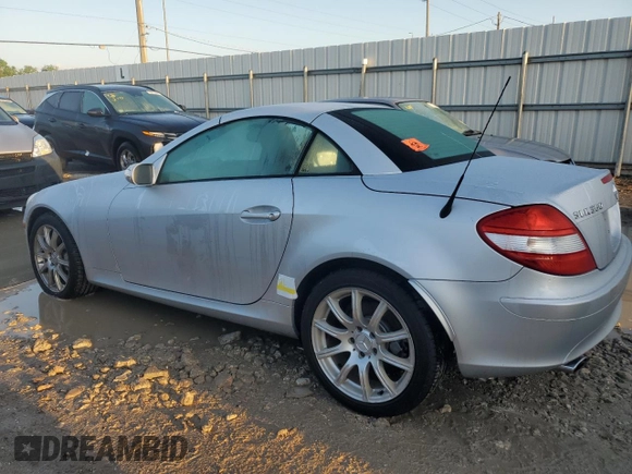 2005 Mercedes-Benz SLK-Class with VIN WDBWK56FX5F060562, listed as a Copart auction lot 73662754 with 0 mi miles and Salvage Title. Bid and sale history available at carsss.com. Image 2.