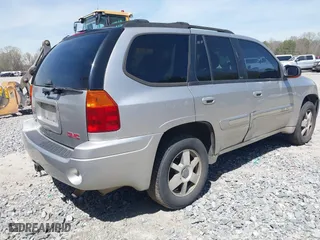 2005 GMC Envoy SLE with VIN 1GKDS13S652390259, listed as a IAAI auction lot 41825258 with 162,172 mi miles. Bid and sale history available at carsss.com. Image 4.