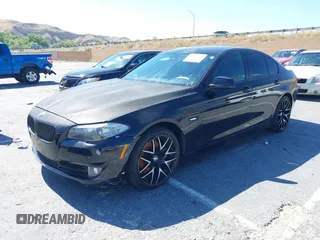 2013 BMW 5 Series 528i with VIN WBAXG5C50DDY35638, listed as a IAAI auction lot 39657715 with 139,765 mi miles and . Bid and sale history available at carsss.com. Image 2.