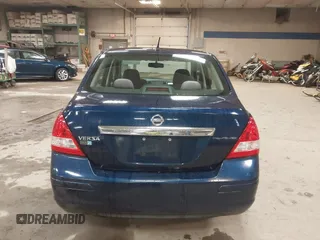2009 Nissan Versa 1.8 S with VIN 3N1BC11E79L440560, listed as a IAAI auction lot 41975289 with 158,726 mi miles. Bid and sale history available at carsss.com. Image 15.