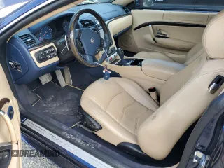 2012 Maserati GranTurismo S with VIN ZAM45KLAXC0063982, listed as a Copart auction lot 58490074 with 25,194 mi miles and Salvage Title. Bid and sale history available at carsss.com. Image 8.