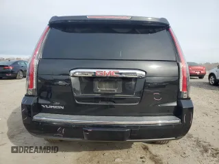 2015 GMC Yukon Denali with VIN 1GKS1CKJ1FR303049, listed as a Copart auction lot 82435514 with 100,693 mi miles and Salvage Title. Bid and sale history available at carsss.com. Image 6.