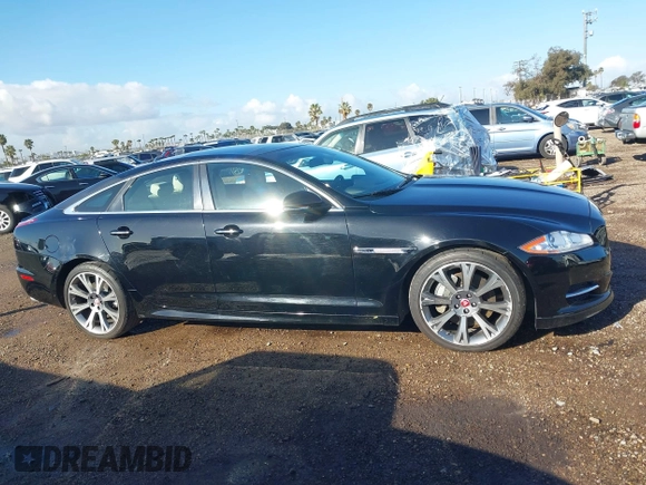 2015 Jaguar XJ with VIN SAJWA1CZ2F8V84677, listed as a IAAI auction lot 41723372 with 52,888 mi miles. Bid and sale history available at carsss.com. Image 13.