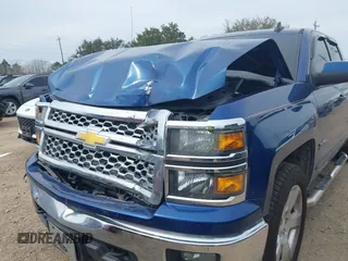 2015 Chevrolet Silverado 1500 LT with VIN 1GCVKREC9FZ179148, listed as a IAAI auction lot 41668536 with 103,853 mi miles and . Bid and sale history available at DreamBid. Image 6.