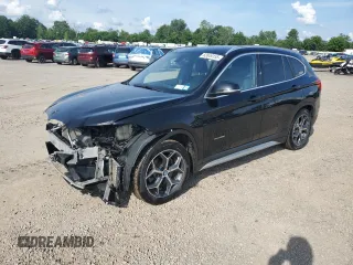 2016 BMW X1 xDrive28i z VIN WBXHT3C36GP883589, wystawiony jako Copart lot #63849155 z przebiegiem 96 672 mil mil oraz Szkoda całkowita • Salvage title. Historia ofert i sprzedaży dostępna na DreamBid. Obrazek 1.