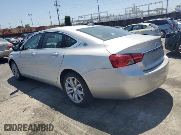 2016 Chevrolet Impala LT with VIN 2G1105SA0G9174795, listed as a Copart auction lot 55632715 with 117,601 mi miles and Salvage title. Bid and sale history available at DreamBid. Image 2.