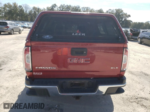 2016 GMC Canyon 4WD SLE with VIN 1GTG6CE37G1161080, listed as a Copart auction lot 42714655 with 172,615 mi miles and Salvage Title. Bid and sale history available at carsss.com. Image 6.