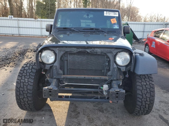 2015 Jeep Wrangler Unlimited Sport with VIN 1C4BJWDG0FL511893, listed as a Copart auction lot 81577784 with 116,042 mi miles and Salvage Title. Bid and sale history available at carsss.com. Image 5.