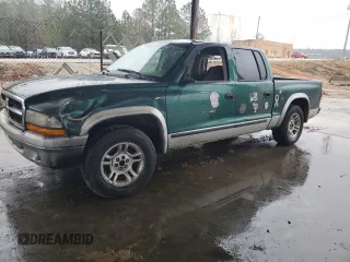 2003 Dodge Dakota SLT with VIN 1D7HL48X03S261436, listed as a Copart auction lot 42317965 with 136,380 mi miles and Salvage Title. Bid and sale history available at carsss.com. Image 1.