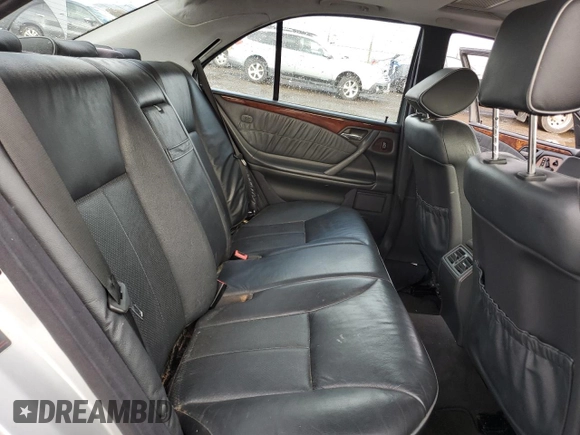 2002 Mercedes-Benz E-Class with VIN WDBJF65J22B464517, listed as a Copart auction lot 82488204 with 217,069 mi miles and Salvage Title. Bid and sale history available at carsss.com. Image 10.