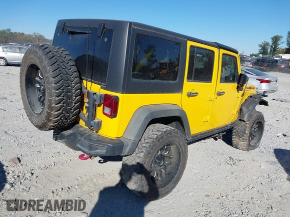 2015 Jeep Wrangler Unlimited Rubicon z VIN 1C4BJWFG4FL681946, wystawiony jako IAAI lot #40809597 z przebiegiem 57 148 mil mil oraz . Historia ofert i sprzedaży dostępna na DreamBid. Obrazek 4.