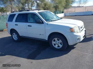 2009 Ford Escape Hybrid with VIN 1FMCU49349KA19086, listed as a IAAI auction lot 41704934 with 91,047 mi miles. Bid and sale history available at carsss.com. Image 1.