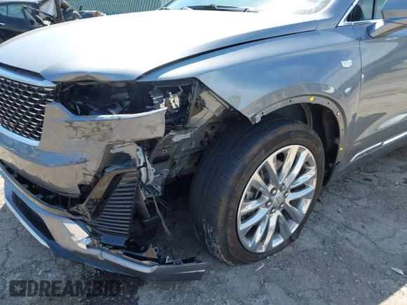 2022 Cadillac XT6 Premium Luxury z VIN 1GYKPDRS4NZ146284, wystawiony jako IAAI lot #42150678 z przebiegiem 28 890 mil mil oraz . Historia ofert i sprzedaży dostępna na DreamBid. Obrazek 6.