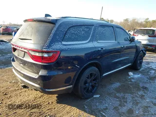 2014 Dodge Durango SXT with VIN 1C4RDHAG5EC369951, listed as a IAAI auction lot 41278358 with 214,453 mi miles and . Bid and sale history available at carsss.com. Image 4.