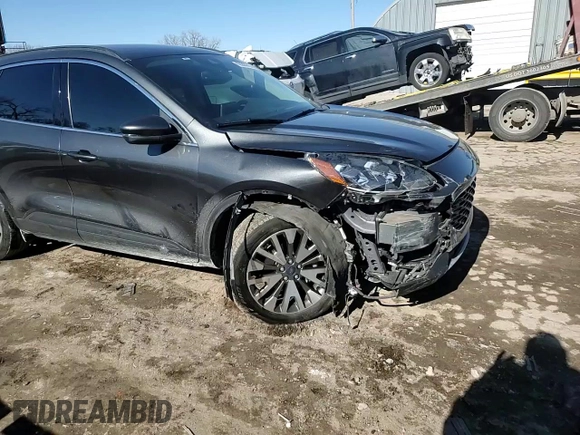 2020 Ford Escape Titanium with VIN 1FMCU9J92LUB45598, listed as a Copart auction lot 42088215 with 65,578 mi miles and Salvage title. Bid and sale history available at DreamBid. Image 12.