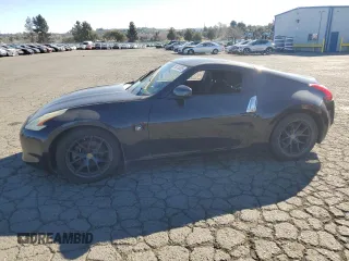 2012 Nissan 370Z Touring with VIN JN1AZ4EH4CM561432, listed as a Copart auction lot 89376935 with 128,955 mi miles and Salvage Title. Bid and sale history available at carsss.com. Image 1.