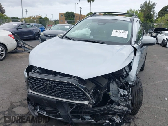 2023 Toyota Corolla Cross XLE with VIN 7MUEAABG8PV077117, listed as a IAAI auction lot 42052305 with 21,571 mi miles and . Bid and sale history available at DreamBid. Image 11.