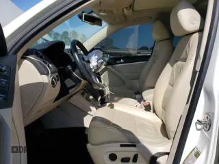 2012 Volkswagen Tiguan SEL with VIN WVGAV7AX9CW530331, listed as a Copart auction lot 50129405 with 141,387 mi miles and Salvage Title. Bid and sale history available at DreamBid. Image 7.