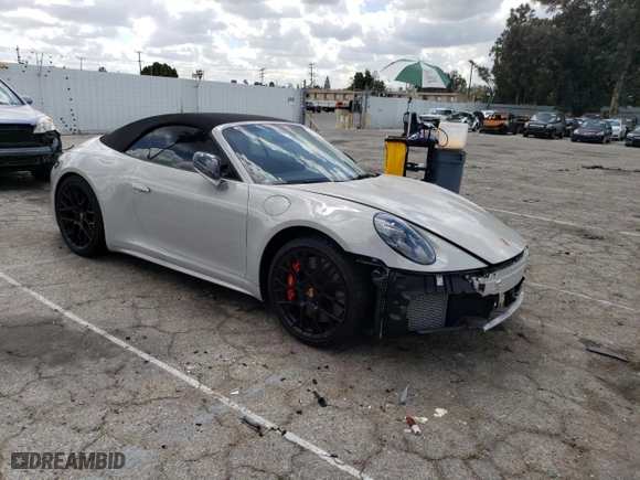 2022 Porsche 911 Carrera S with VIN WP0CB2A97NS244840, listed as a Copart auction lot 49349563 with 1,465 mi miles. Bid and sale history available at carsss.com. Image 4.