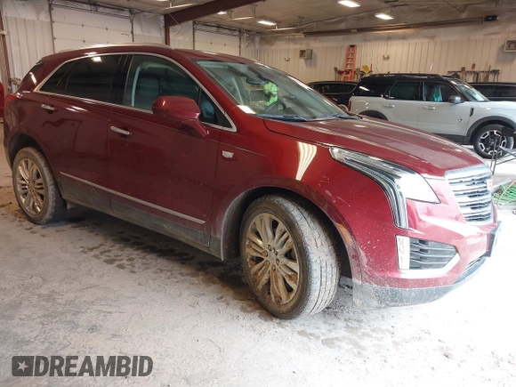 2018 Cadillac XT5 Premium Luxury AWD z VIN 1GYKNFRS6JZ114464, wystawiony jako IAAI lot #42320302 z przebiegiem 61 231 mil mil oraz . Historia ofert i sprzedaży dostępna na DreamBid. Obrazek 1.
