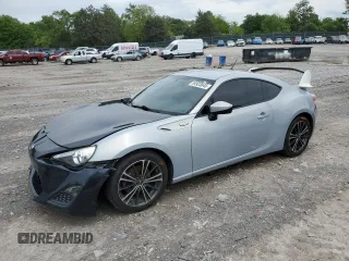 2013 Scion FR-S z VIN JF1ZNAA10D2730352, wystawiony jako Copart lot #54923045 z przebiegiem 138 123 mil mil oraz Czysty tytuł • Clean title. Historia ofert i sprzedaży dostępna na DreamBid. Obrazek 1.