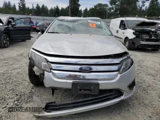 2012 Ford Fusion Hybrid с VIN 3FADP0L30CR284761, выставлен на аукционе Copart как лот 61286445 с пробегом 171 073 миль миль и Списание • Salvage title. История ставок и продаж доступна на DreamBid. Изображение 5.