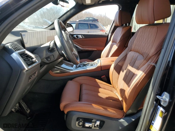 2024 BMW X7 M60i with VIN 5UX33EM08R9T81499, listed as a Copart auction lot 47220095 with 5,328 mi miles and Salvage Title. Bid and sale history available at carsss.com. Image 7.