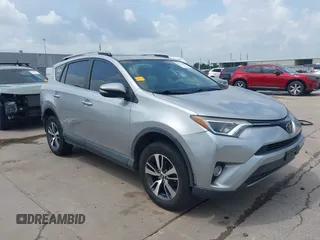 2018 Toyota RAV4 XLE z VIN JTMWFREV5JJ202927, wystawiony jako IAAI lot #42111306 z przebiegiem 118 385 mil mil oraz . Historia ofert i sprzedaży dostępna na DreamBid. Obrazek 1.