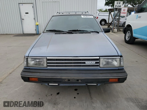 1985 Nissan Sentra z VIN JN1PB15S6FU172045, wystawiony jako Copart lot #54384475 z przebiegiem 134 117 mil mil oraz Szkoda całkowita • Salvage title. Historia ofert i sprzedaży dostępna na DreamBid. Obrazek 5.