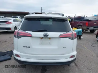 2017 Toyota RAV4 LE with VIN JTMZFREV1HJ103223, listed as a IAAI auction lot 41571466 with 96,860 mi miles and . Bid and sale history available at carsss.com. Image 16.