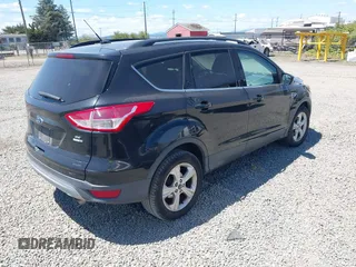 2014 Ford Escape SE with VIN 1FMCU9GX7EUB53012, listed as a IAAI auction lot 42639014 with Not provided miles and . Bid and sale history available at DreamBid. Image 4.