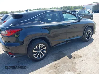 2021 Lexus RX with VIN 2T2AZMAA2MC196524, listed as a IAAI auction lot 42017362 with 80,922 mi miles. Bid and sale history available at carsss.com. Image 4.