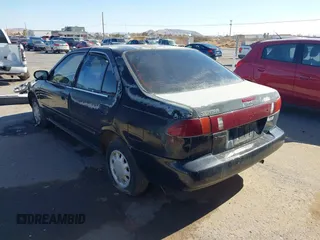 1997 Nissan Sentra XE z VIN 3N1AB41D5VL026257, wystawiony jako IAAI lot #41286097 z przebiegiem 125 583 mil mil oraz . Historia ofert i sprzedaży dostępna na DreamBid. Obrazek 3.