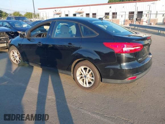 2017 Ford Focus SE with VIN 1FADP3F2XHL251700, listed as a IAAI auction lot 42632094 with 165,308 mi miles and . Bid and sale history available at DreamBid. Image 3.