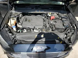 2018 Ford Fusion SE z VIN 3FA6P0HDXJR130677, wystawiony jako Copart lot #51737345 z przebiegiem 129 918 mil mil oraz Szkoda całkowita • Salvage title. Historia ofert i sprzedaży dostępna na DreamBid. Obrazek 13.