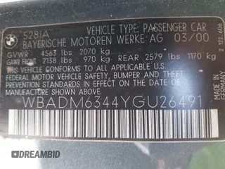 2000 BMW 5 Series 528iA with VIN WBADM6344YGU26491, listed as a IAAI auction lot 40301317 with 157,798 mi miles. Bid and sale history available at carsss.com. Image 9.