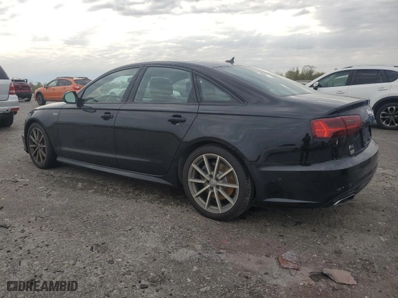 2016 Audi A6 3.0T Premium Plus with VIN WAUFGAFC6GN015092, listed as a Copart auction lot 52959565 with 94,311 mi miles and Salvage Title. Bid and sale history available at carsss.com. Image 2.