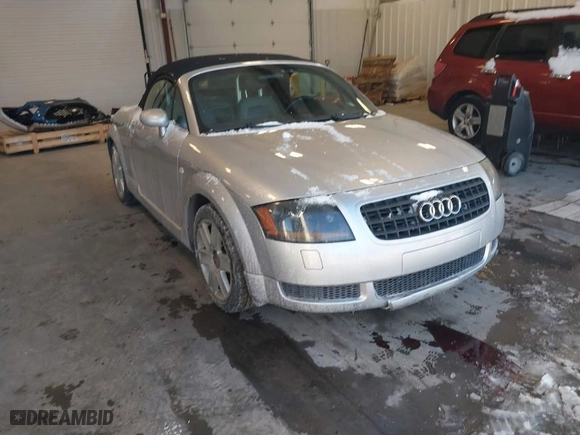 2004 Audi TT with VIN TRUUT28N141023216, listed as a IAAI auction lot 41386891 with 124,395 mi miles. Bid and sale history available at carsss.com. Image 1.