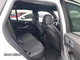2020 BMW X5 sDrive40i with VIN 5UXCR4C04L9D41635, listed as a IAAI auction lot 42201174 with 64,989 mi miles and . Bid and sale history available at DreamBid. Image 8.