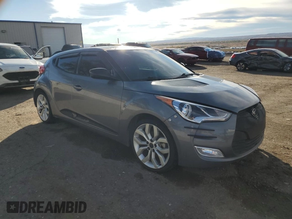 2013 Hyundai Veloster w/Black Int z VIN KMHTC6AD0DU135773, wystawiony jako Copart lot #41367875 z przebiegiem 96 487 mil mil oraz Szkoda całkowita • Salvage title. Historia ofert i sprzedaży dostępna na DreamBid. Obrazek 4.